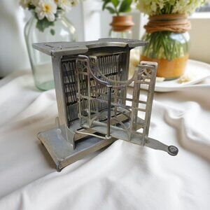 Vintage Universal Electric Toaster with Swing-Out Rotating Bread Holders — Antiq